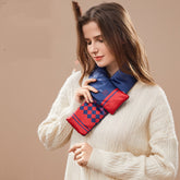 Graphene Winter Warm Neck Protection Heating Scarf worn by a woman in a cozy white sweater, showcasing its vibrant design.