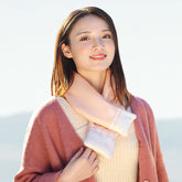 Graphene Winter Warm Neck Protection Heating Scarf worn by a woman, showcasing its stylish design and warmth.
