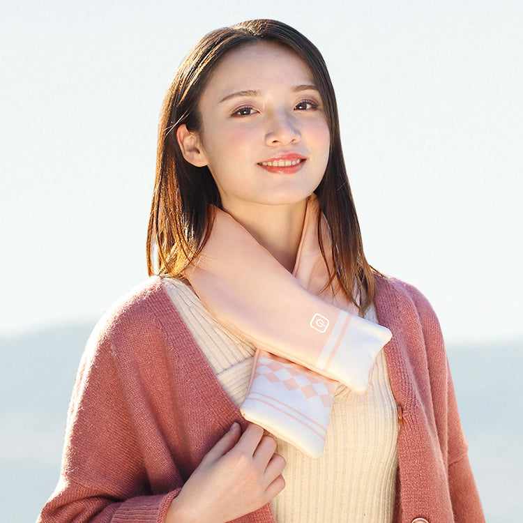 Graphene Winter Warm Neck Protection Heating Scarf worn by a woman, showcasing its stylish design and warmth.